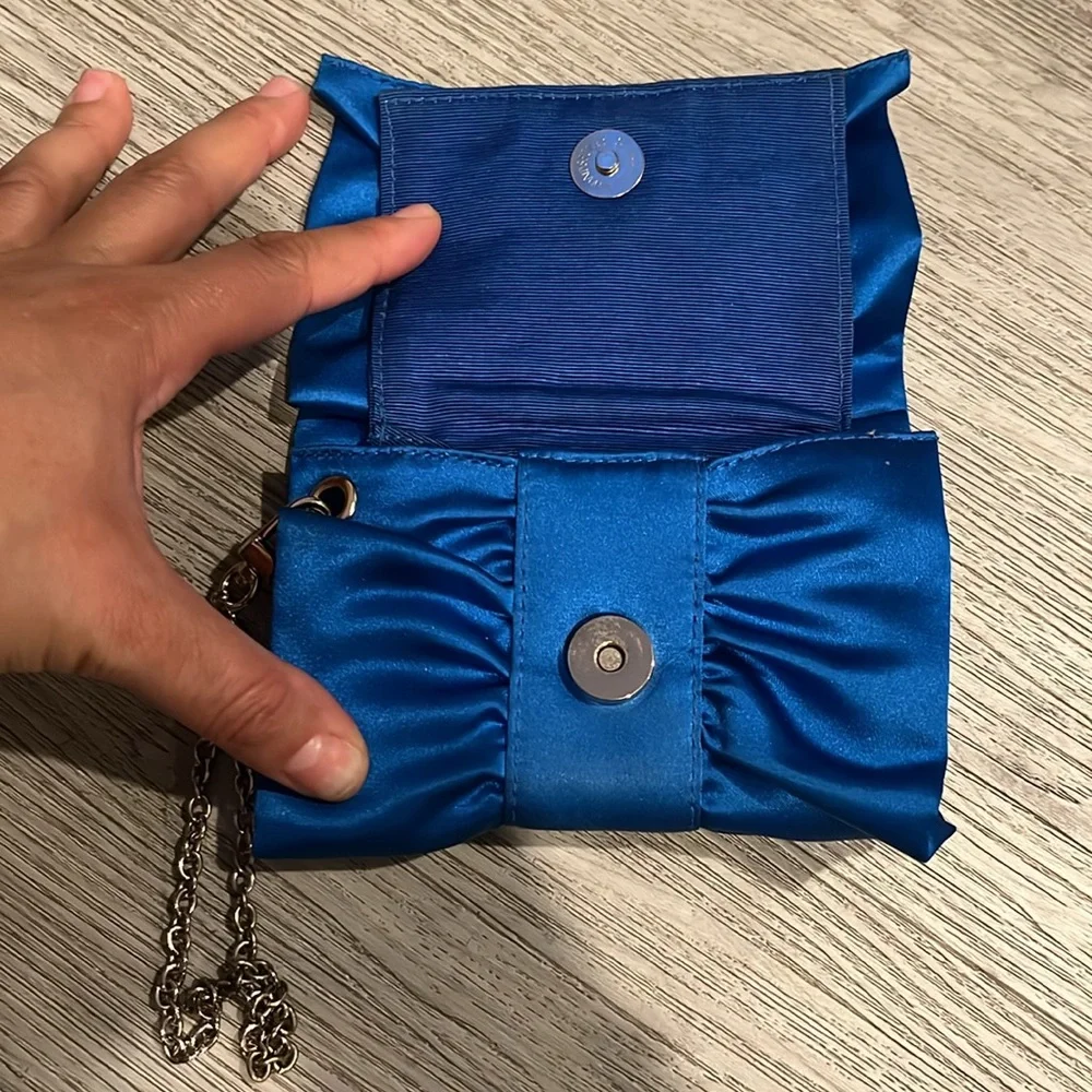 NWOT BCBG royal blue small clutch
